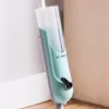 A close-up shot of the handle and water reservoir of a spray mop, leaning against a wall. Náhled obrázku produktu