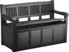 A dark gray storage bench with a slatted back and seat, and louvered doors on the front. Produktbild-Vorschau