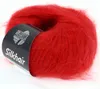A ball of red yarn with a black label. Produktbild-Vorschau
