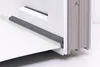 A close-up view of a window seal and part of a window frame, set against a white background. Náhled obrázku produktu