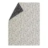 A folded blanket with a dog pattern on both sides. Produktbild-Vorschau