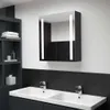A modern bathroom with a double sink, faucets, and a mirrored cabinet with LED lights. Podgląd zdjęcia produktu