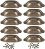 A set of 10 antique bronze shell drawer pulls and screws, arranged in rows on a white background. Produktbild-Vorschau