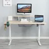 A standing desk setup with a computer, laptop, and accessories. Náhled obrázku produktu