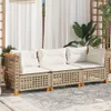 An outdoor sofa with white cushions on a patterned rug, with white curtains and greenery in the background. Produktbild-Vorschau