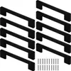A collection of black cabinet handles and screws arranged on a white background. Produktbild-Vorschau