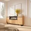 A modern living room with a sideboard featuring an electric fireplace. Produktbild-Vorschau