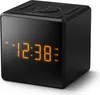 A black cube-shaped digital alarm clock with an orange digital display. Produktbild-Vorschau