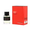 A bottle of Frederic Malle French Lover Eau De Parfum and its red packaging are displayed against a white background. Podgląd zdjęcia produktu