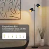 A modern living room scene featuring a floor lamp and a sofa. Produktbild-Vorschau