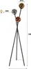 A floor lamp with three spherical glass shades in different metallic finishes, supported by a tripod base. Produktbild-Vorschau