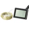 A solar panel and a coiled string of lights on a white background. Podgląd zdjęcia produktu