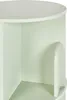 A close-up view of a light green shelf unit. Náhled obrázku produktu