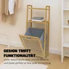 A bamboo laundry basket with shelves in a room. Podgląd zdjęcia produktu