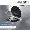 A toilet seat with the lid open, shown in a bathroom setting. Náhled obrázku produktu
