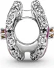 A close-up studio shot of a horseshoe-shaped charm. Produktbild-Vorschau