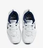 A top-down view of a pair of white Nike Air Monarch IV 4E sneakers against a white background. Produktbild-Vorschau