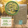 A bag of bird feed is shown on a wooden surface, with a close-up of the feed in a circular inset. Text overlays highlight product features. Produktbild-Vorschau