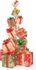 A stack of illuminated gift boxes arranged in a Christmas tree shape. Produktbild-Vorschau