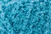 A close-up, detailed view of a ball of turquoise yarn. Anteprima dell’immagine prodotto