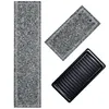 Three raclette grill components are arranged on a white background. Produktbild-Vorschau