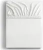 A white fitted sheet is laid flat on a white surface, with the top portion showing gathered fabric due to the elastic. Produktbild-Vorschau