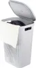 A white laundry basket with a lid is shown against a white background. A white towel is draped over the side of the basket. Náhľad obrázku produktu