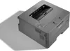 A gray Brother laser printer is shown from a high angle on a light gray background. Produktbild-Vorschau