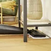 A steam mop head is shown under a shelf with decorative vases and books. Produktbild-Vorschau