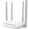 A white Mercusys router with four gray antennas, shown from a front-diagonal angle against a white background. Voir les images du produit