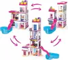 A collage of three different configurations of a Barbie Dreamhouse toy set, showing different ways to assemble it, with pink arrows indicating movement or connection. Podgląd zdjęcia produktu