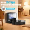 A robot vacuum cleaner and its charging station are shown in a living room setting. Produktbild-Vorschau