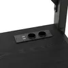 A close-up view of a black desk surface with an integrated power and USB hub. Produktbild-Vorschau