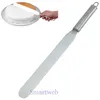 A hand is using a spatula to frost a cake. Produktbild-Vorschau