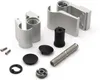 Various metal and plastic components of a door hinge system are laid out on a white background. Produktbild-Vorschau