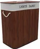 A laundry basket with two compartments, made of bamboo. Produktbild-Vorschau