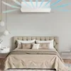 A bedroom with a bed, air conditioner, and decorative elements. Produktbild-Vorschau