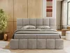 A bedroom scene featuring a large upholstered bed. Produktbild-Vorschau