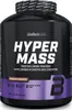 A black plastic container of protein powder with purple and white labeling. Voir les images du produit