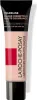 A product shot of a tube of foundation. Voir les images du produit