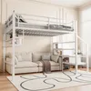 A white metal loft bed with a sofa underneath, set up in a bedroom. Náhled obrázku produktu