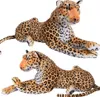 Two plush toy leopards lying down against a white background. Produktbild-Vorschau