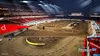 An aerial view of a stadium set up for a motocross race, with a dirt track and seating areas visible. Produktbild-Vorschau