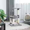 Two cats are playing on a cat tree in a room with curtains and a litter box in the background. Náhľad obrázku produktu
