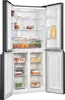 An open refrigerator with shelves and drawers stocked with food items. Produktbild-Vorschau