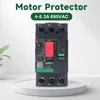 A motor protector device is displayed on a white pedestal against a light gray background with a plant on the left. Voir les images du produit