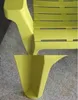 A close-up view of a green garden chair, showing its leg and seat. Produktbild-Vorschau