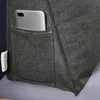 A close-up view of a gray fabric product with a pocket holding a silver smartphone. Produktbild-Vorschau