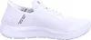 A white Skechers slip-on sneaker is shown from the side against a white background. Voir les images du produit
