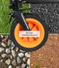 A collage of four different ground surfaces surrounding a wheel of a cart, with text overlay. Produktbild-Vorschau